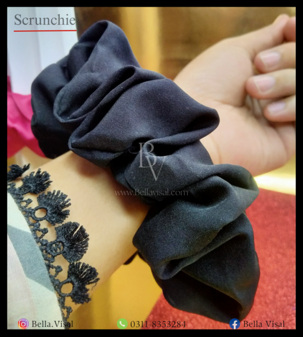 Scrunchie, hair care, hair tie, hair band, silk stuff, healthy hair, girly, a hand wrapped with scrunchie